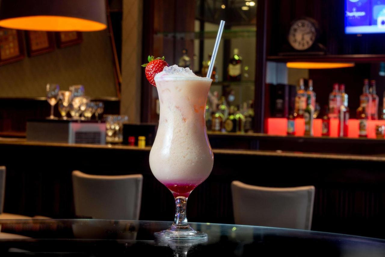 Hotel Deville Prime Porto Alegre Dış mekan fotoğraf A strawberry daiquiri